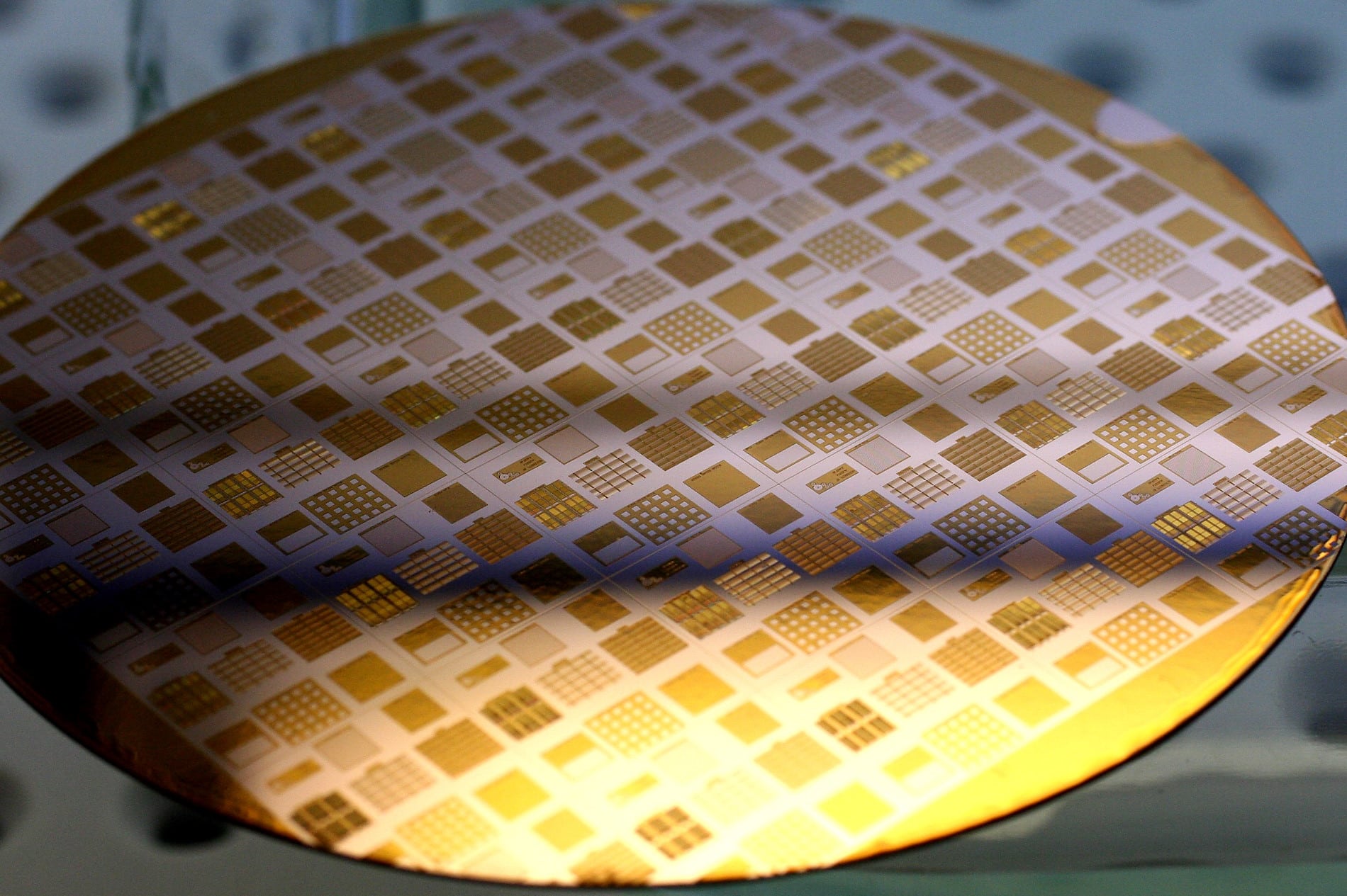 Close-up of a processed silicon wafer at the University of Alberta nanoFAB, showcasing microfabricated structures used in semiconductor and nanotechnology research.